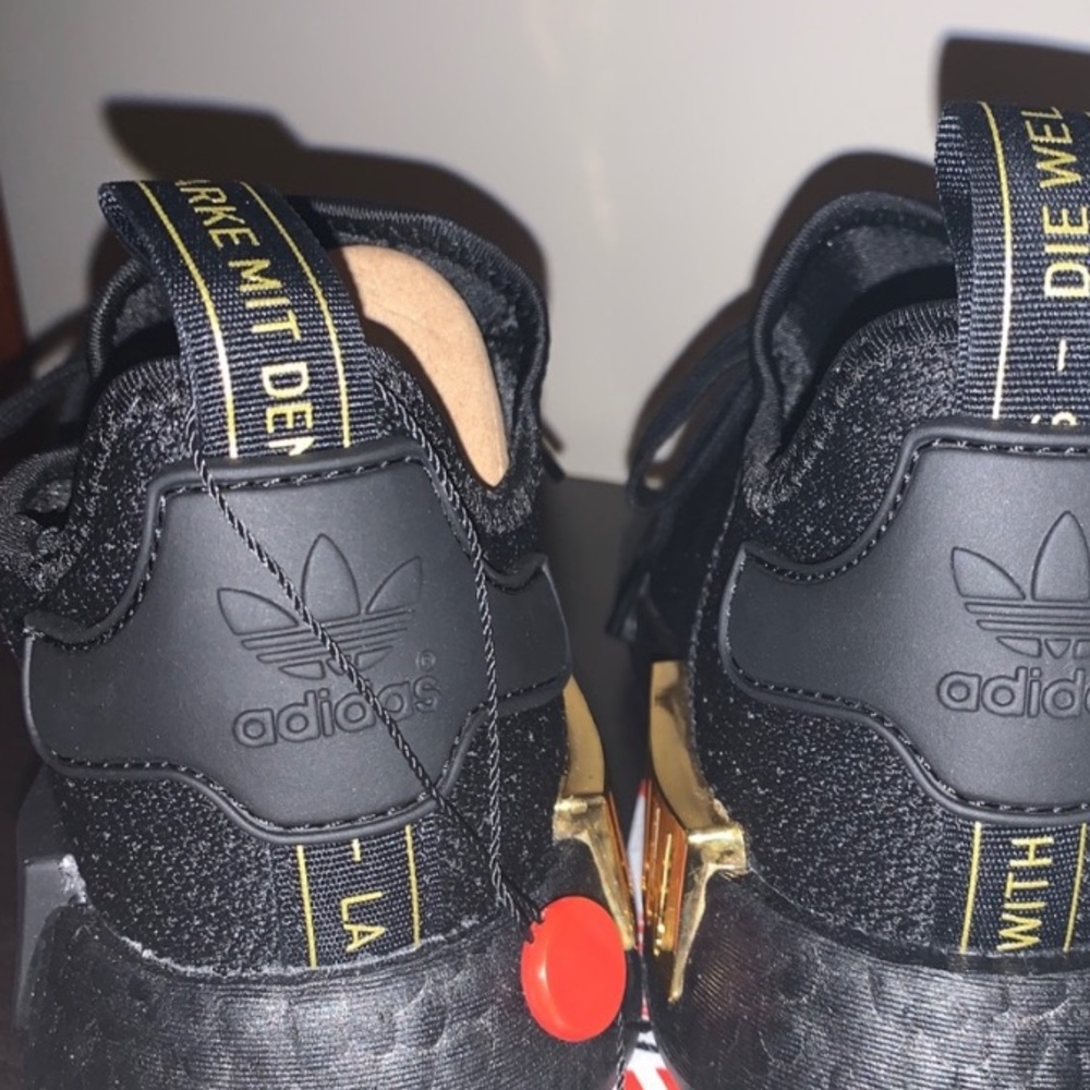 ADIDAS NMD BLACK AND GOLD